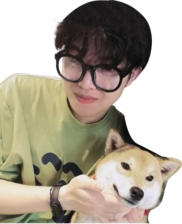 Polar holding a Shiba Inu